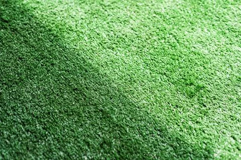 Artificial green grass texture background for soccer field, golf course, lawn Stock Photos