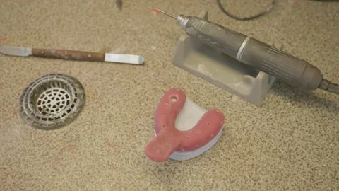 An artificial gum model used for the training of dental practice students Stock Footage 259194771