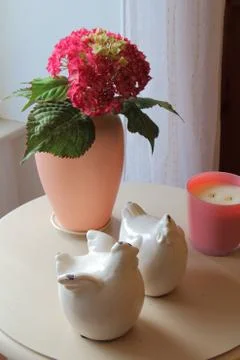 Artificial hydrangea in a vase and decorations Stock Photos