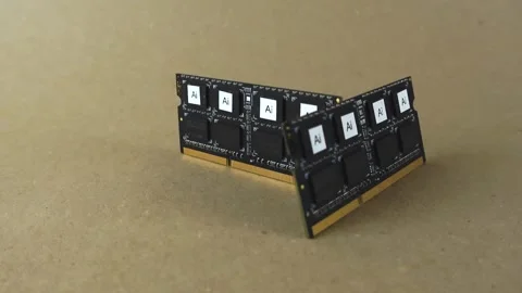 Artificial intelligence AI computer memory chips spinning on a surface Stock Footage 344855930