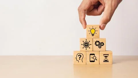 Artificial intelligence and creative problem solving concept with hand stac.. Stock Photos