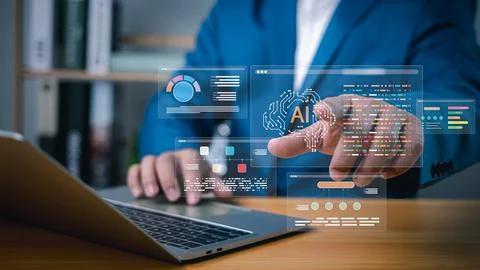 Artificial intelligence and data analysis  businessman using laptop with AI.. Stock Photos