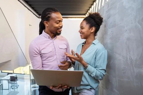 Artificial intelligence and technology development team using laptops, coding 库存照片