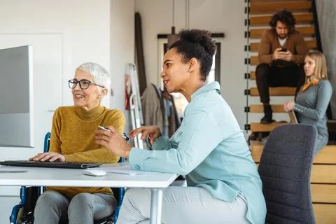Artificial intelligence and technology development team using laptops, codi.. Stock Photos