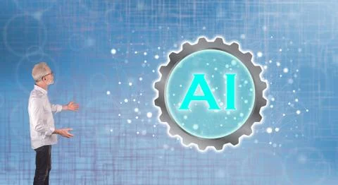 An artificial intelligence concept explained by a businessman on a wall scree Stock Photos