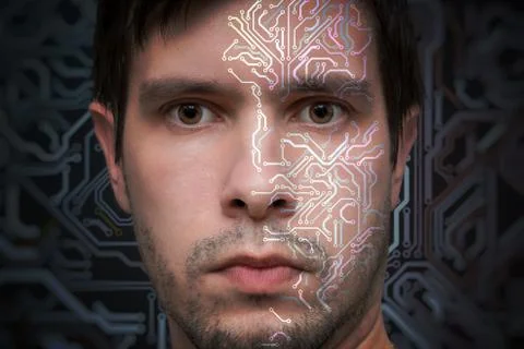 Artificial intelligence concept. Face of man with electronic circuit. Stock Photos