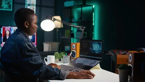 Artificial intelligence engineer working from home using notebook Stock Footage 319540943