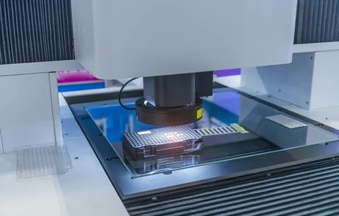 Artificial intelligence machine with camera sensor working in chip factory Stock Photos