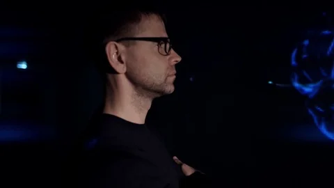 Artificial Intelligence. The man is studying the 3d model of the human brain. Video stock 77676867