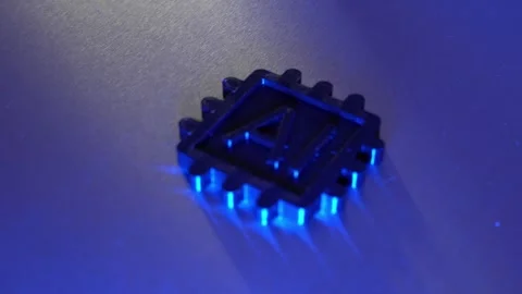 Artificial Intelligence Microchip Concept on Metal Background in Blue Light Stock Footage 347819551