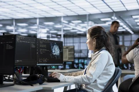 Artificial intelligence programmer at work in data center Foto stock
