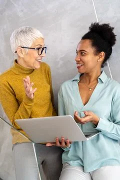 Artificial intelligence, programming innovation. Teamwork with laptops for Stock Photos