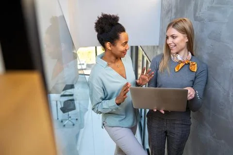 Artificial intelligence, programming innovation. Teamwork with laptops for Stock Photos