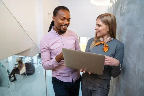 Artificial intelligence, programming innovation. Teamwork with laptops for Stock Photos