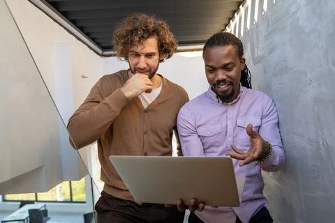 Artificial intelligence, programming innovation. Teamwork with laptops for .. Stock Photos