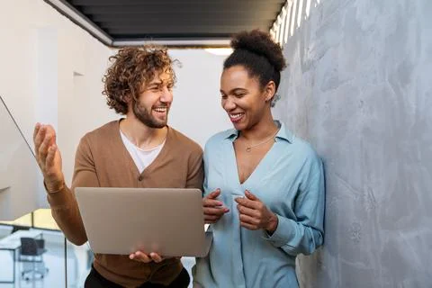 Artificial intelligence, programming innovation. Teamwork with laptops for Stock Photos