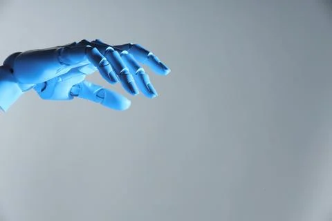 Artificial intelligence. Robot hand gesturing on grey background, space for.. Stock Photos