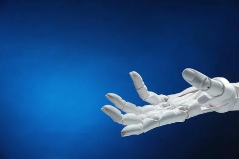 Artificial intelligence. Robot hand gesturing on dark blue background, spac.. Stock Photos