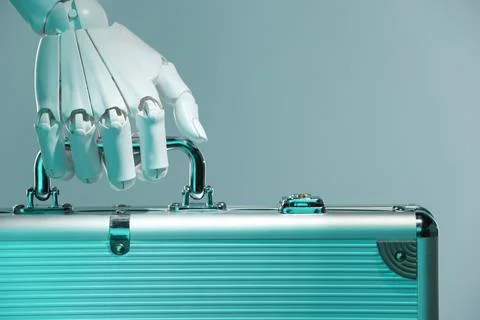 Artificial intelligence. Robot hand with metal case on grey background, close Stock Photos