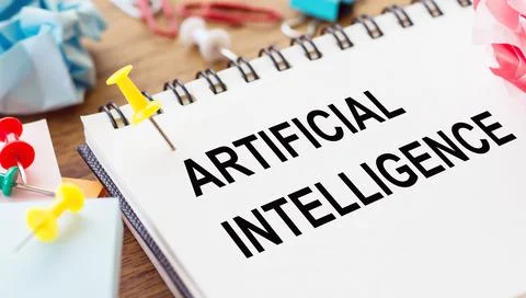 ARTIFICIAL INTELLIGENCE text on a notepad with wrinkled paper and paper needl 스톡 사진