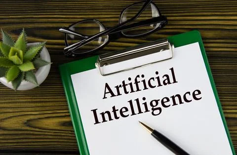 ARTIFICIAL INTELLIGENCE - words on a white sheet on a brown wooden backgrou.. Stock Photos