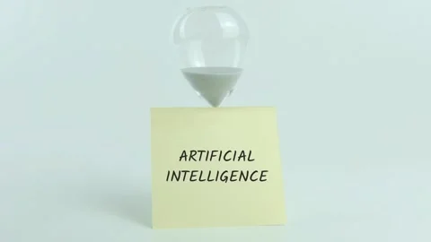Artificial Intelligence written on yellow sticky note placed on hourglass Stock Footage 313460947
