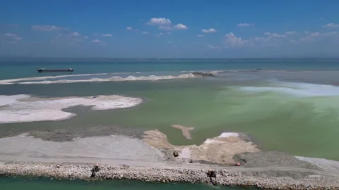Artificial island reclamation construction excavator. Great aerial view drone Stock Footage 344606691