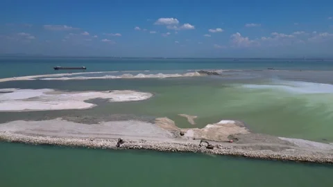 Artificial island reclamation construction excavator. Nice aerial view drone Stock Footage 344607401