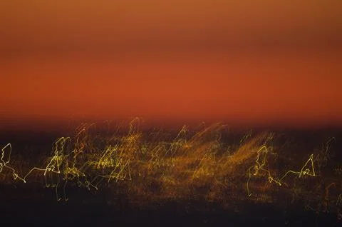 Artificial lights at sunset. Stock Photos