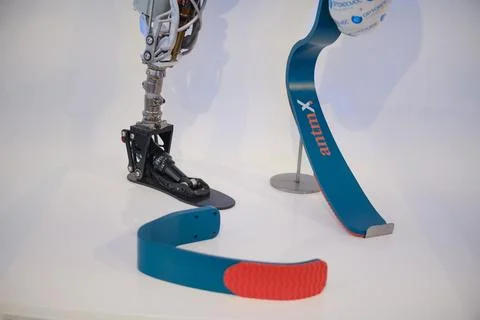 Artificial limb prosthetic arm with blue and red. Stock Photos