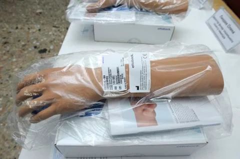 Artificial limbs placed on a table Stock Photos