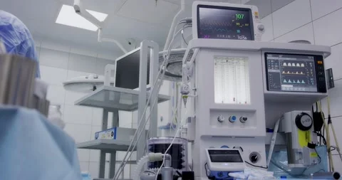 Artificial lung ventilation device. Heart monitor during surgery Stock Footage 166029385