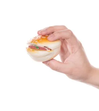 Artificial nice hamburger in hand Stock-Fotos