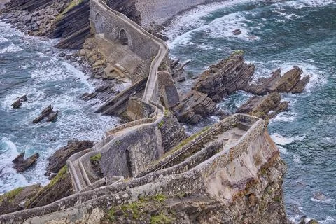 Artificial path to the hermitage of San Juan de Gaztelugatxe island Stock Photos