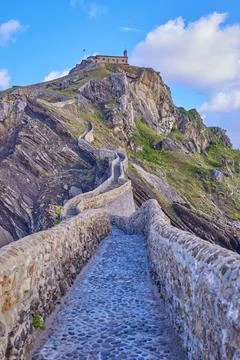 Artificial path to the hermitage of San Juan de Gaztelugatxe island Stock Photos