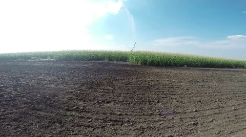 Artificial Rain Over Dry Plowed Field Stock Footage 68417458
