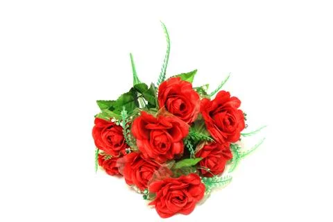 Artificial red roses on a white background Stock Photos