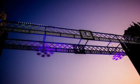Artificial river bridge covered in lights in diwali fair Stock Photos