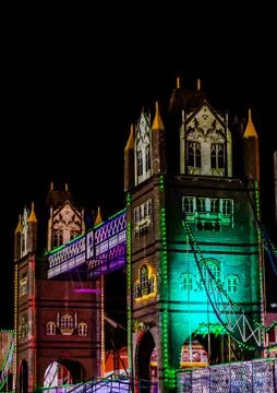 Artificial river bridge covered in lights in diwali fair Stock Photos