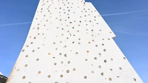 Artificial rock climbing showing various colored grips Stock Footage 126663308