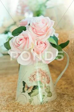Artificial roses bouquet flowers arrange for decoration in home Stock Photos