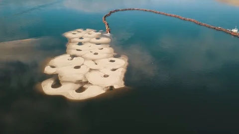 Artificial sand island. Dredging on a river. Drone view Stock Footage 101767674