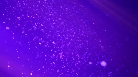 Artificial snow is falling on the background of bright lights.mp4 Stock Footage 60123401