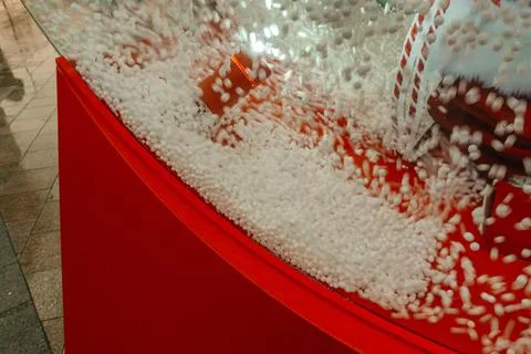 Artificial snow in the window. plastic snow for decoration Stock Photos