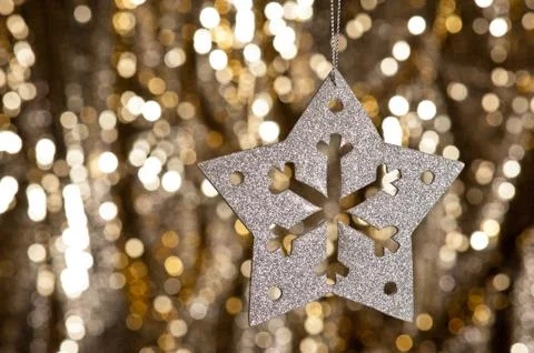 Artificial snowflake in silver Stock Photos
