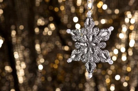 Artificial snowflake in silver Stock Photos