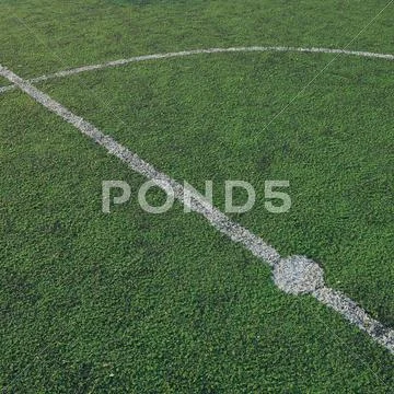 Artificial soccer field stadium on the green grass, sport game background for Stock Photos