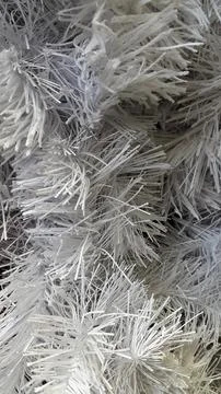 Artificial spruce. White branches of an artificial Christmas Stock Photos