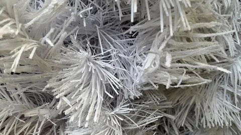 Artificial spruce. White branches of an artificial Christmas tre Stock Photos