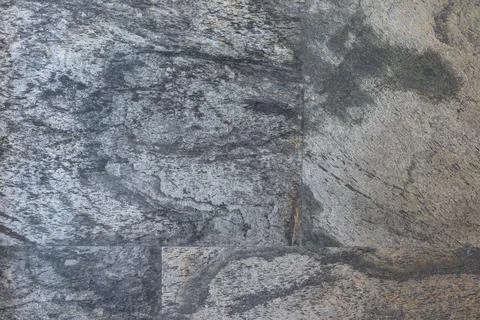Artificial stone wall, decorative plastic panel imitating natural stone. Stock Photos